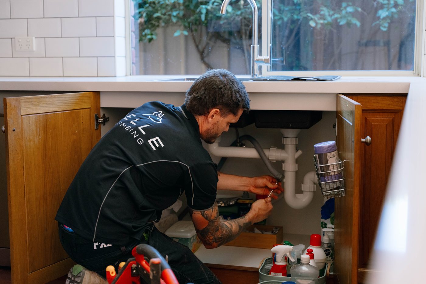 Belle Plumbing technician at work