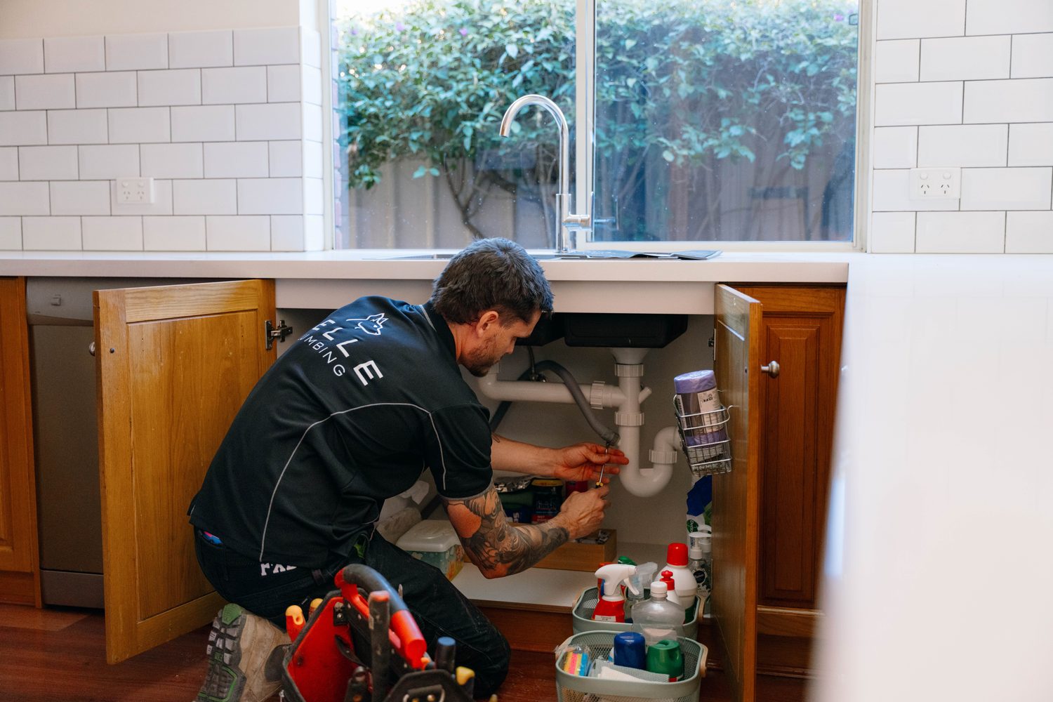 Under-sink kitchen plumbing repair